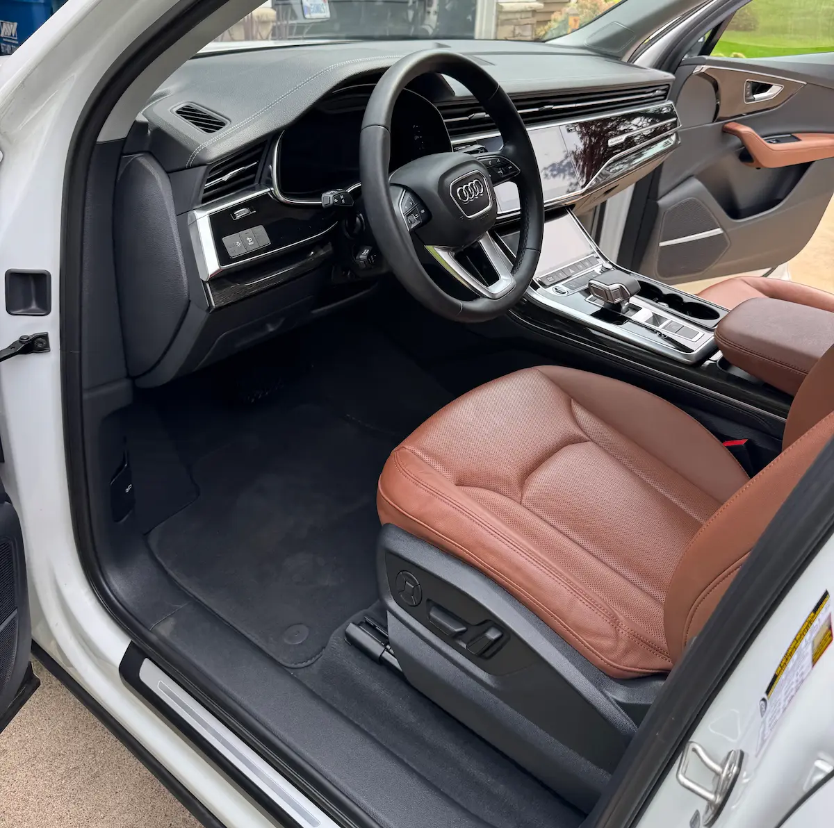 Interior car detailing service in West Michigan with deep cleaning of carpets, leather, and hard surfaces by Elysian Auto Detailing